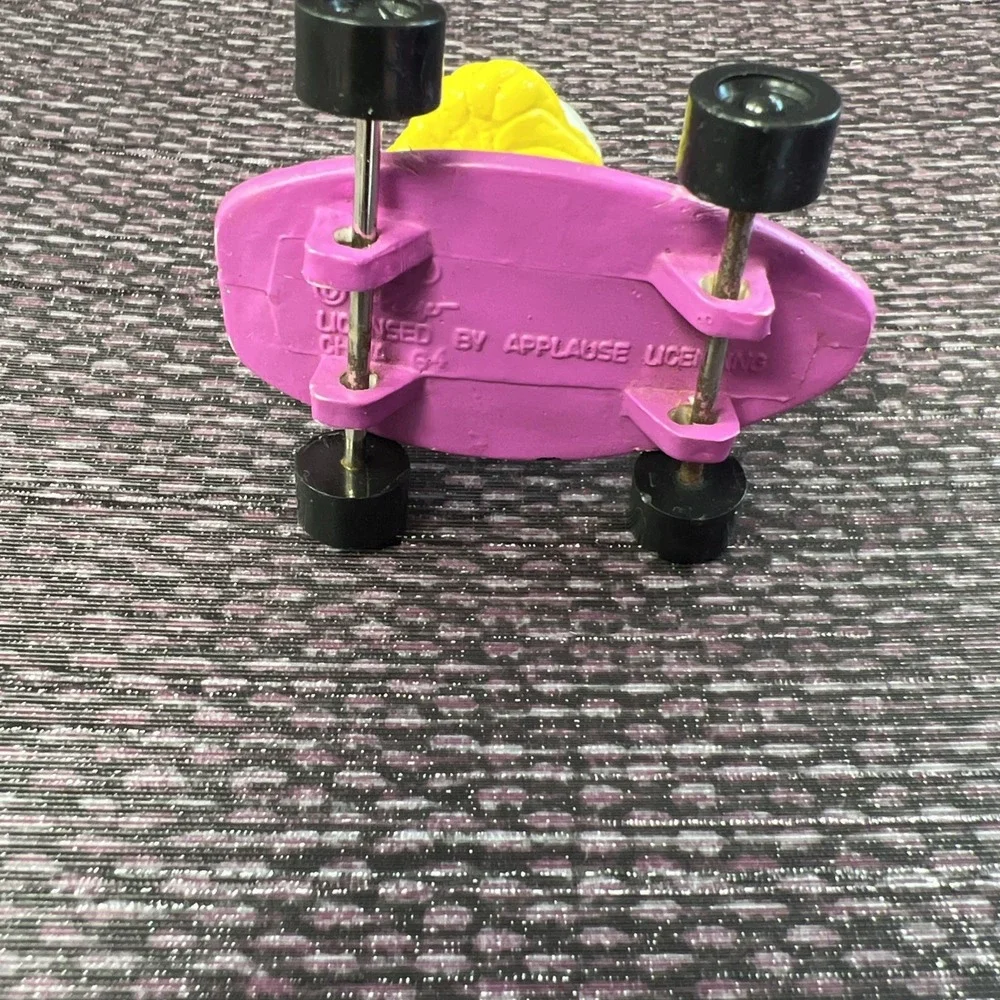 Hardees‎ Kids Meal Toy 1990 Smurfs - Smurfette on Purple Skateboard